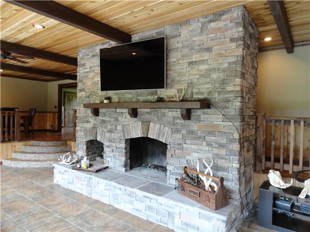 1460 Poplar Ridge Road Chapmansboro, TN 37035 - Photo 1 of 20 Beautiful new stone wood burning fireplace