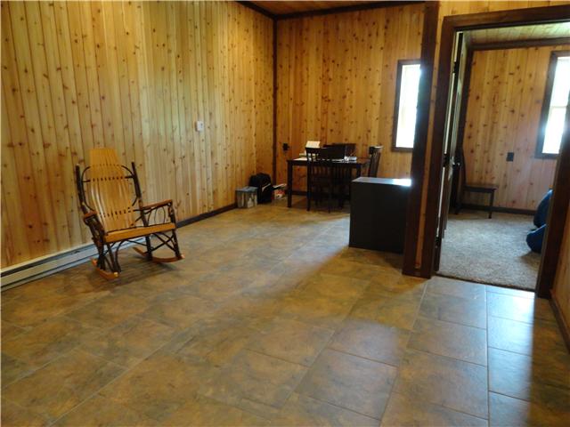 1460 Poplar Ridge Road Chapmansboro, TN 37035 - Photo 14 of 20 This area has a separate entrance & would be perfect as in law quarters or guest suite. It has a room without a closet not counted as the 5th bedroom