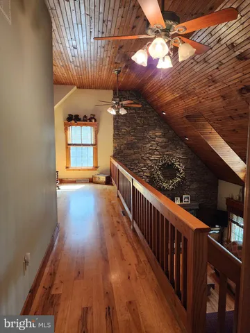 a bathroom with a sink a mirror and a bathtub
