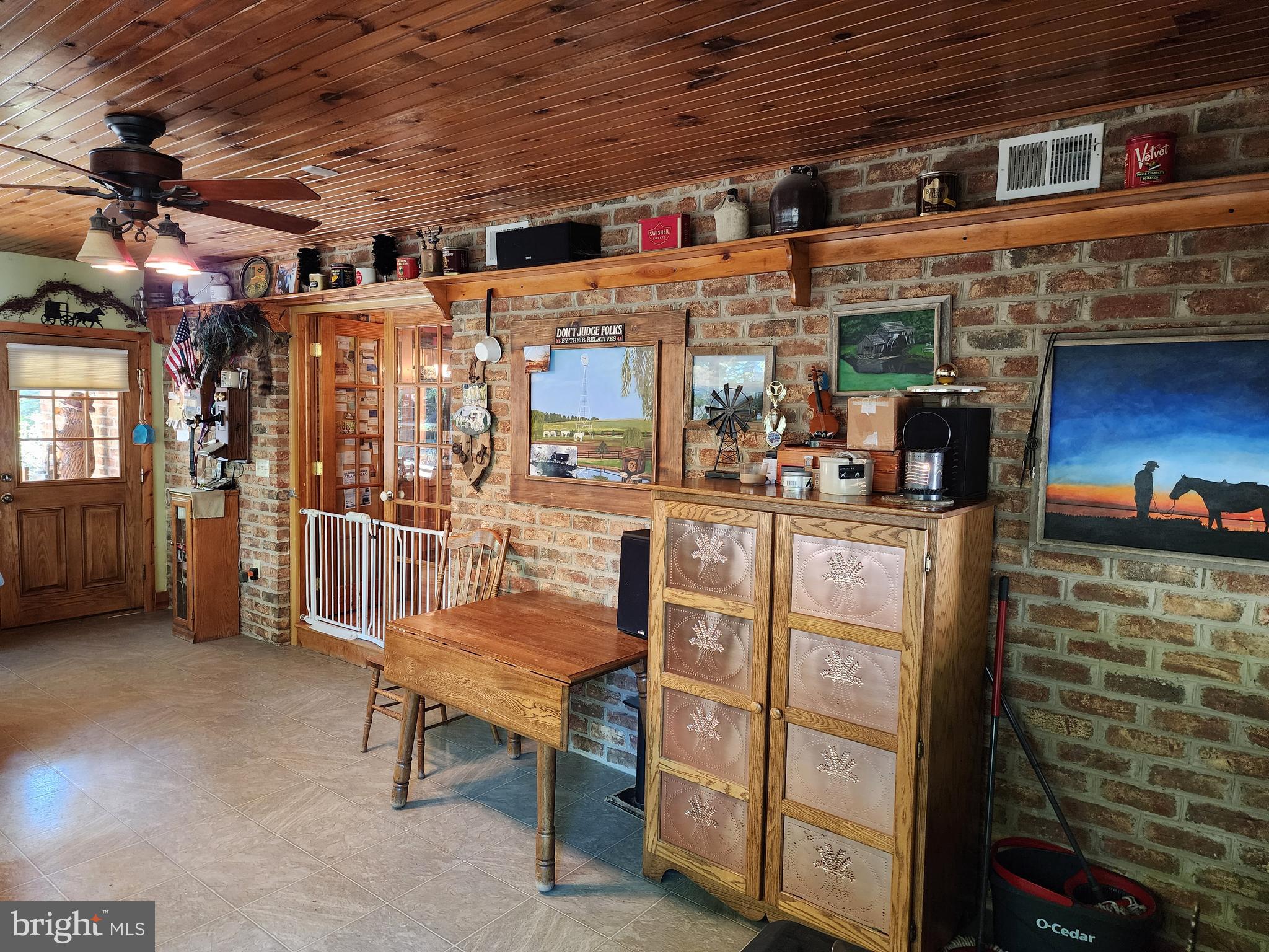 14847 White Oak Ridge Hancock, MD 21750 - Photo 25 of 101 a room with lots of wooden furniture and a view of living room