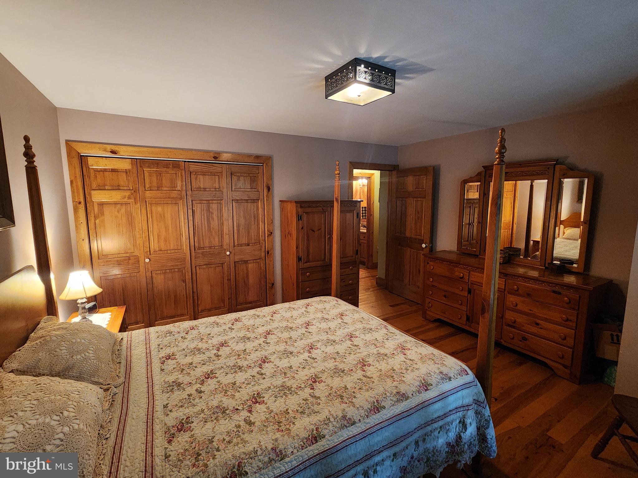14847 White Oak Ridge Hancock, MD 21750 - Photo 34 of 101 a bedroom with a bed and a dresser