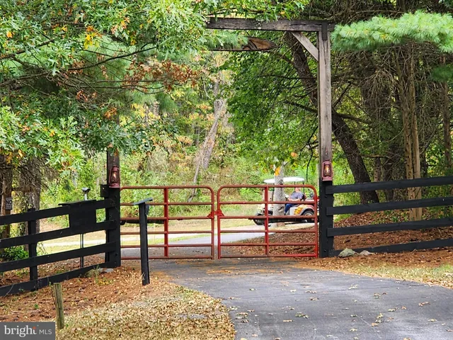 a kitchen with a refrigerator and a stove