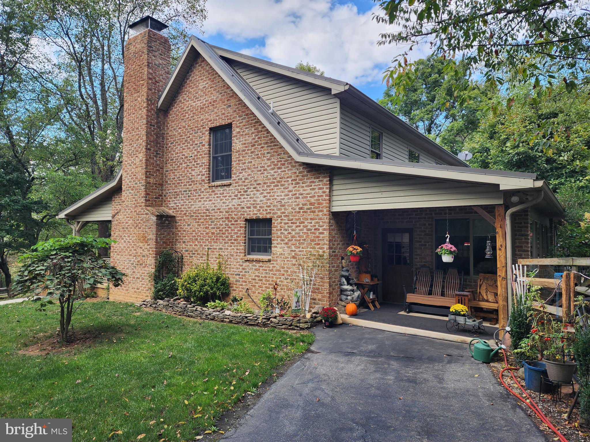 14847 White Oak Ridge Hancock, MD 21750 - Photo 73 of 101 a view of the house with backyard and garden