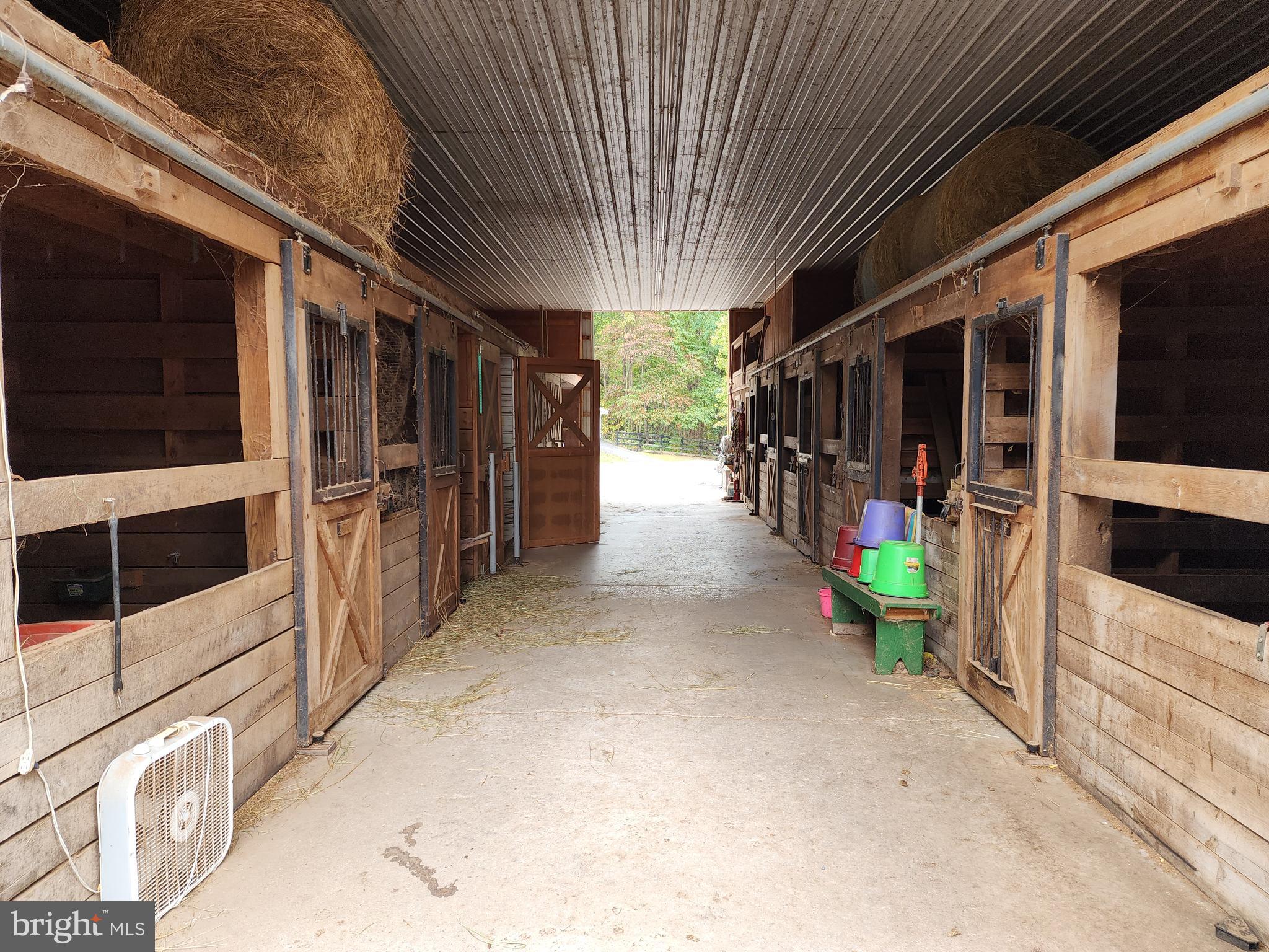14847 White Oak Ridge Hancock, MD 21750 - Photo 83 of 101 View Of Horse Stalls From The Back Of The Barn