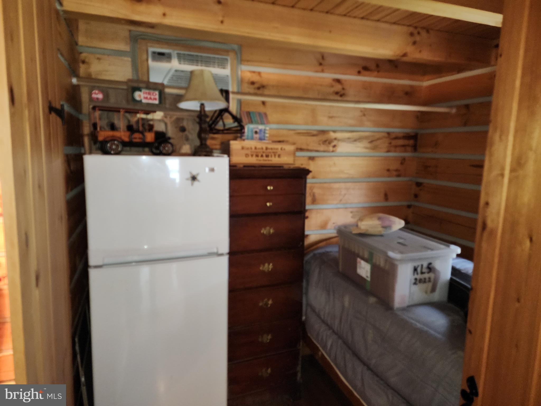 14847 White Oak Ridge Hancock, MD 21750 - Photo 96 of 101 a kitchen with a refrigerator and a stove