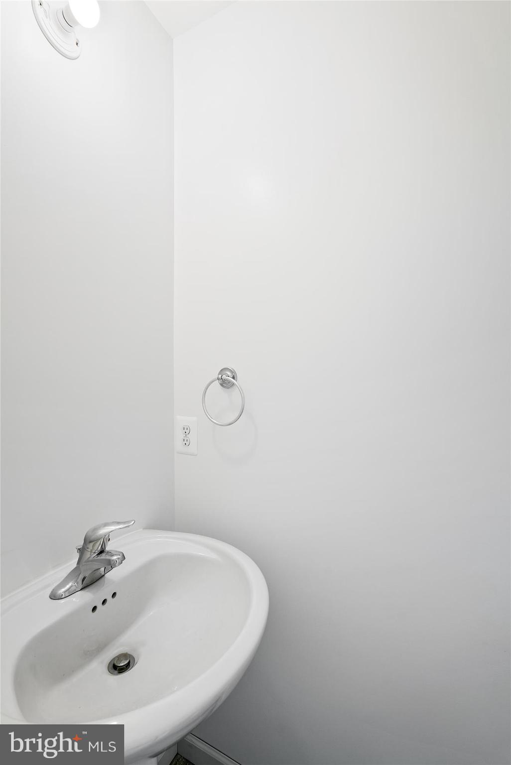 2 Cedar Ridge Road Rapidan, VA 22733 - Photo 29 of 59 a bathroom with a sink and a mirror