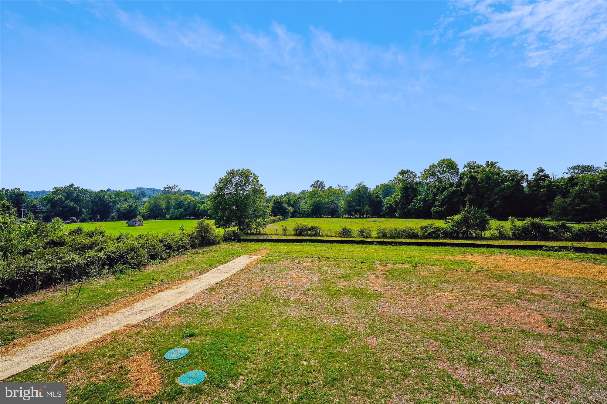 2 Cedar Ridge Road Rapidan, VA 22733 - Photo 8 of 59 a view of a swimming pool and trees in the background