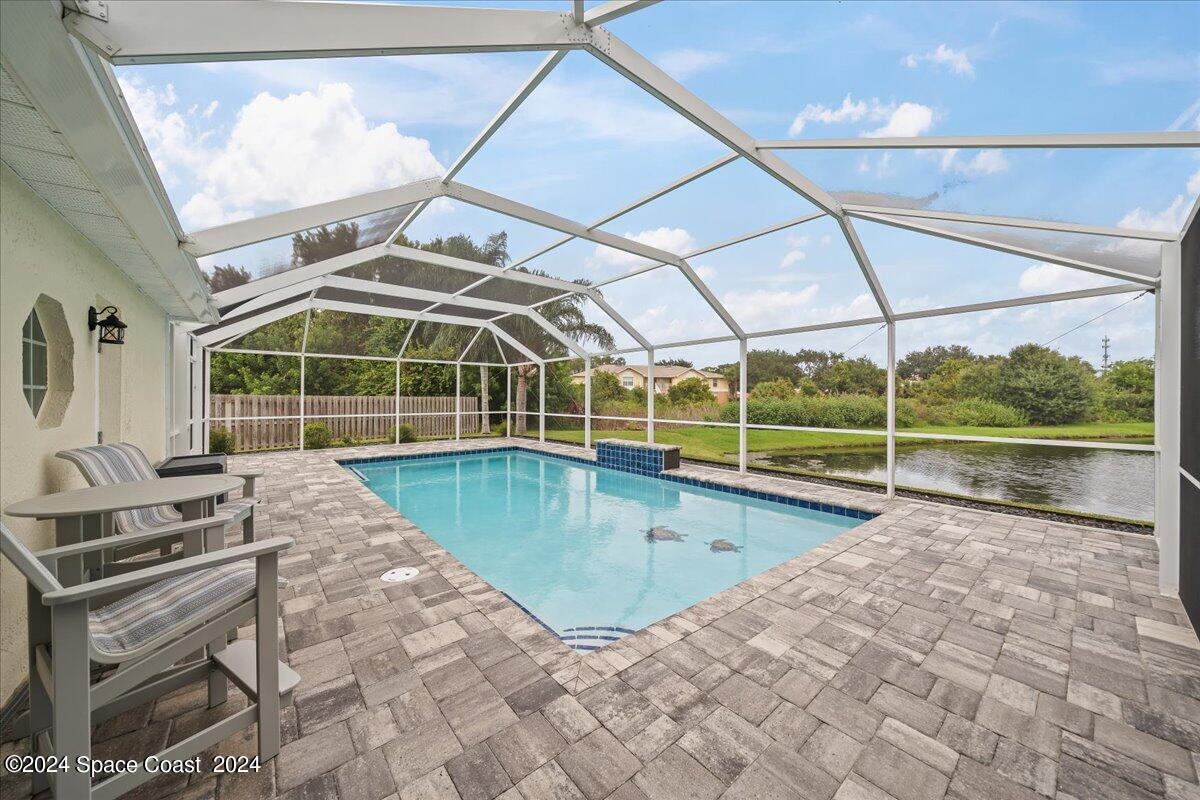3905 Grand Meadows Boulevard Melbourne, FL 32934 - Photo 25 of 32 a view of outdoor space with swimming pool