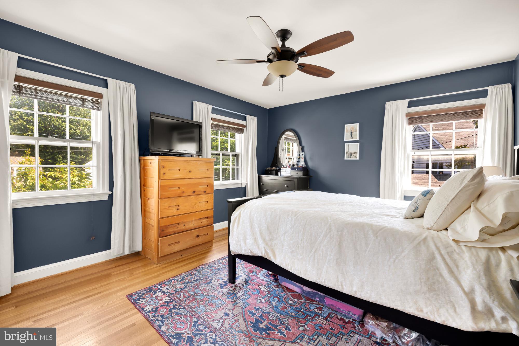 1802 August Drive Silver Spring, MD 20902 - Photo 12 of 26 a bedroom with a bed and a dresser