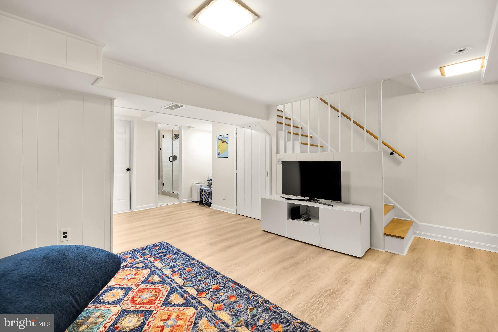 1802 August Drive Silver Spring, MD 20902 - Photo 17 of 26 a bedroom with a bed and a flat screen tv