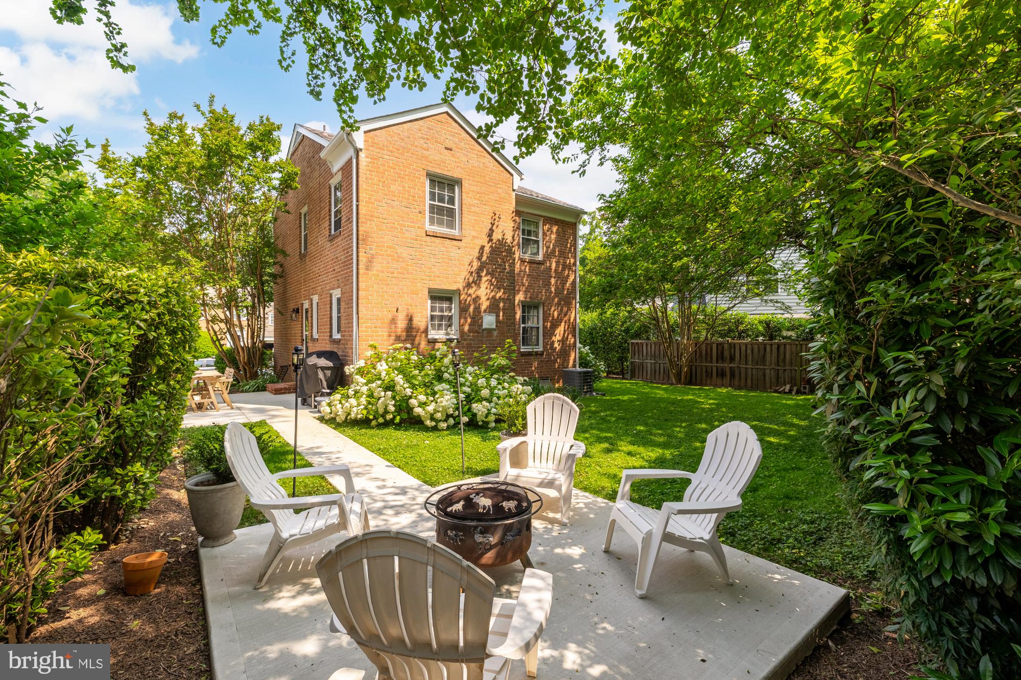 1802 August Drive Silver Spring, MD 20902 - Photo 22 of 26 a view of backyard of patio and outdoor seating