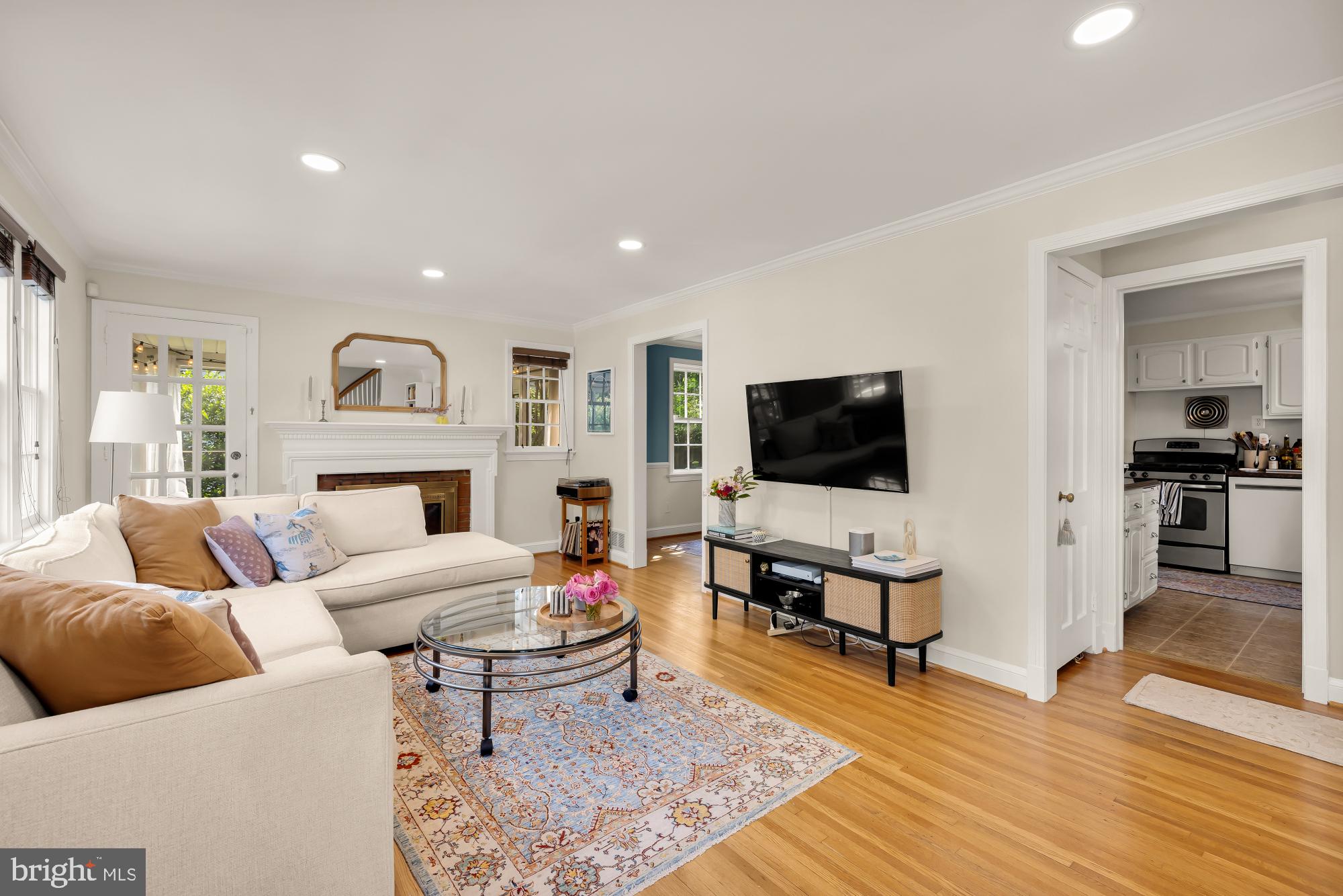 1802 August Drive Silver Spring, MD 20902 - Photo 3 of 26 a living room with furniture and a flat screen tv