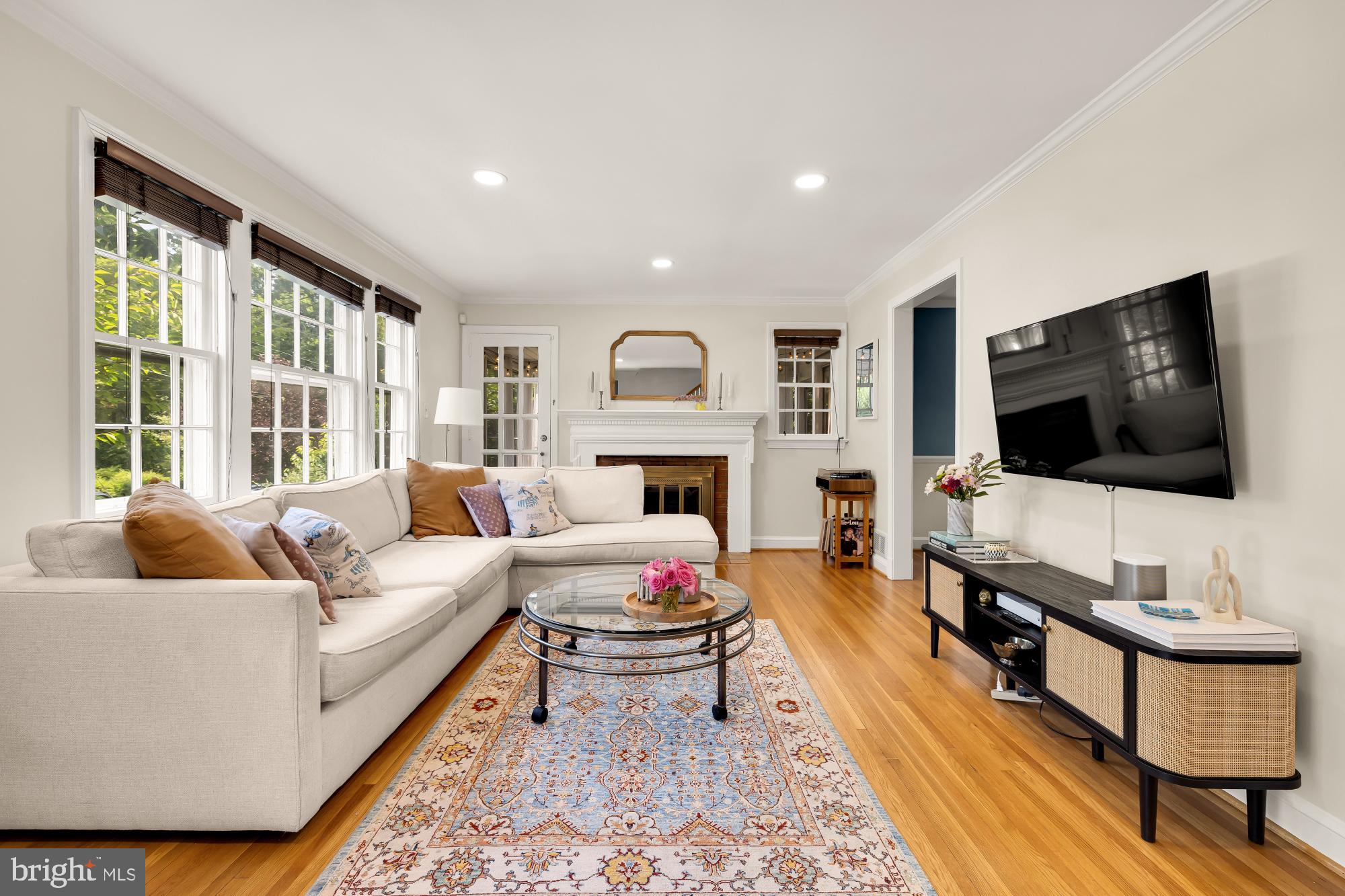1802 August Drive Silver Spring, MD 20902 - Photo 4 of 26 a living room with furniture and a flat screen tv