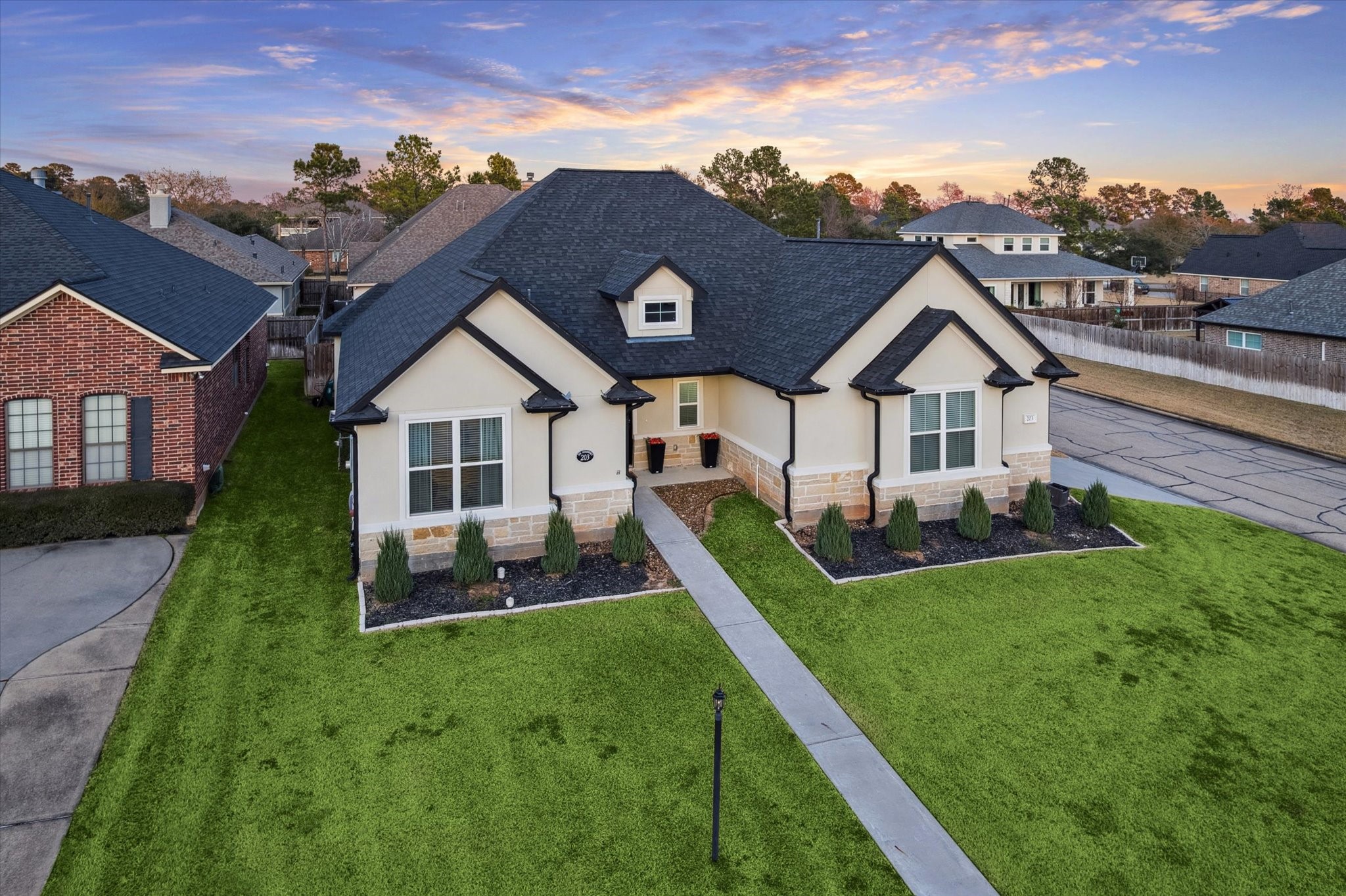 203 Hampton Glen Road Montgomery, TX 77356 - Photo 1 of 35 Nestled in the prestigious private country club community of Bentwater this stunning like-new custom build showcases over $35K in recent updates.