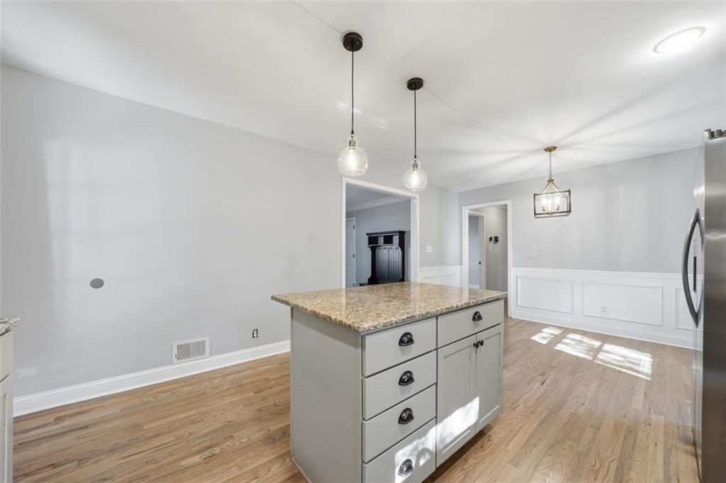 2002 Drew Valley Road Northeast Brookhaven, GA 30319 - Photo 12 of 51 a spacious bathroom with a granite countertop sink a mirror and a shower