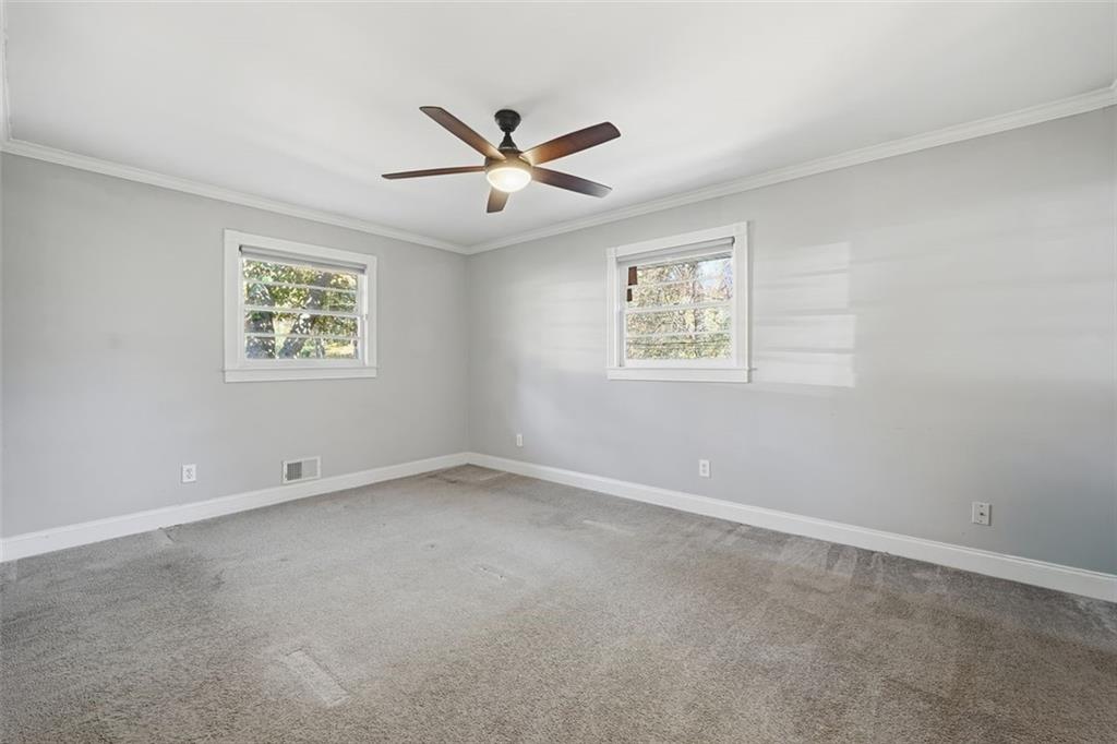 2002 Drew Valley Road Northeast Brookhaven, GA 30319 - Photo 17 of 51 a view of an empty room with a window