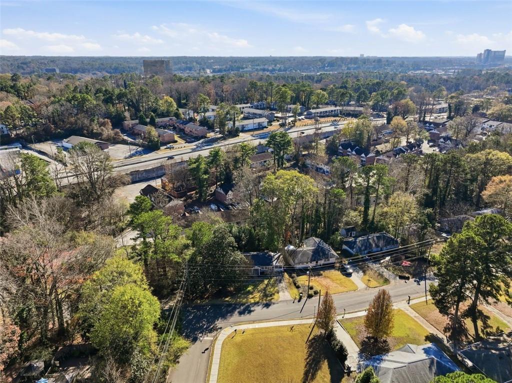 2002 Drew Valley Road Northeast Brookhaven, GA 30319 - Photo 2 of 51 an aerial view of a residential houses with outdoor space and trees all around