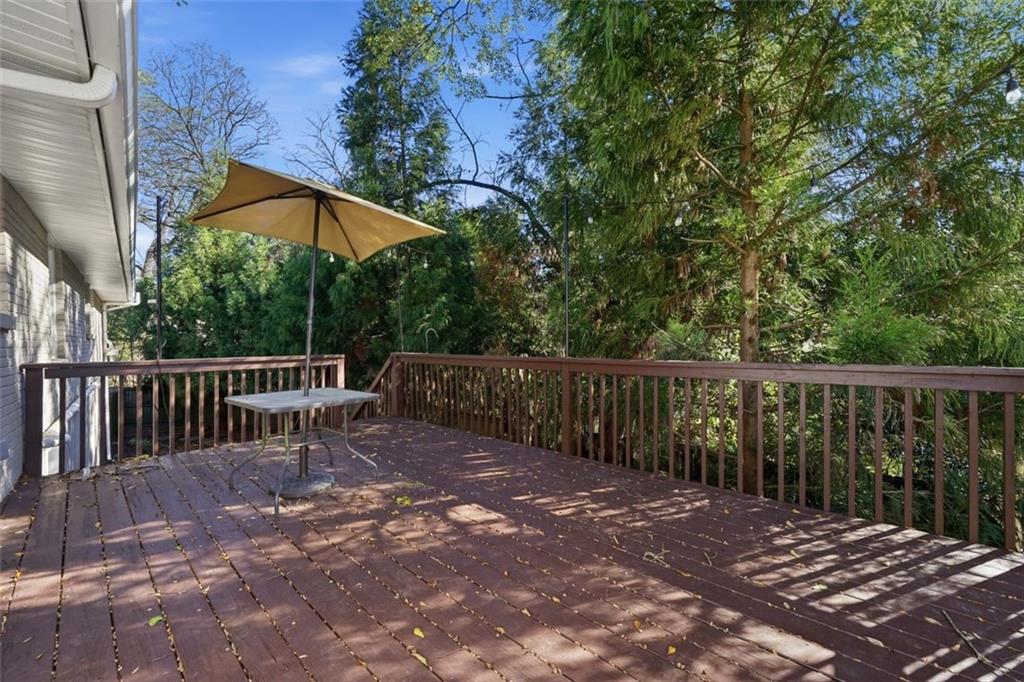 2002 Drew Valley Road Northeast Brookhaven, GA 30319 - Photo 25 of 51 a view of balcony with wooden floor and fence