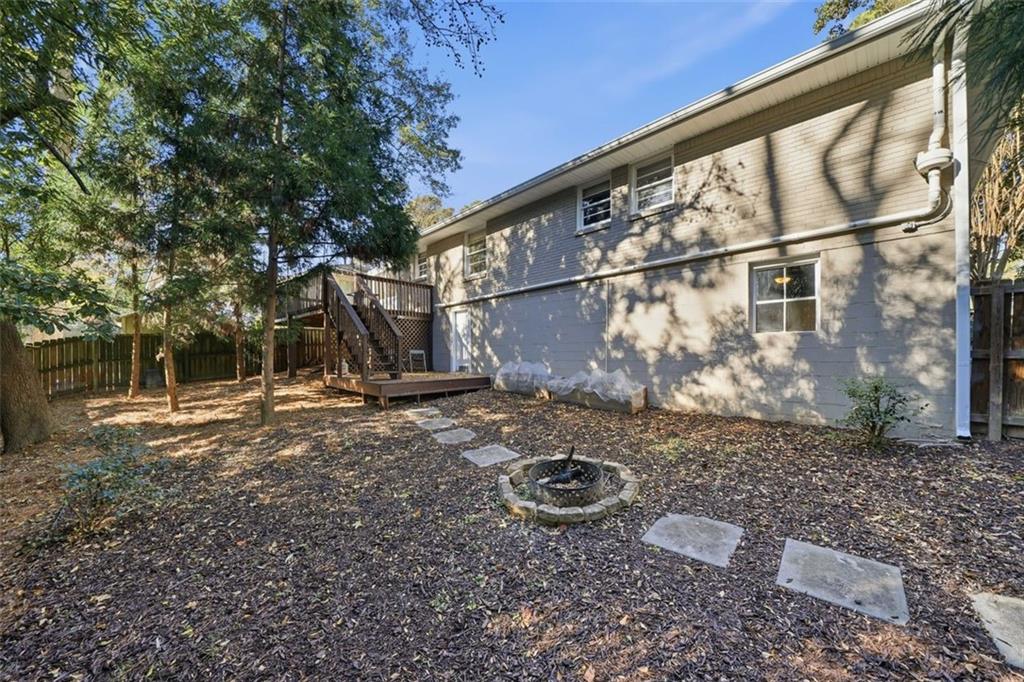 2002 Drew Valley Road Northeast Brookhaven, GA 30319 - Photo 30 of 51 a view of a backyard with plants and large trees