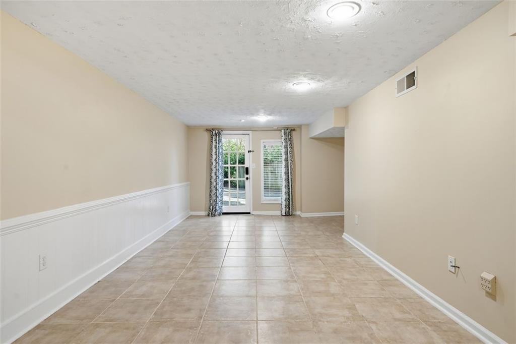 2002 Drew Valley Road Northeast Brookhaven, GA 30319 - Photo 37 of 51 a view of an empty room with a window