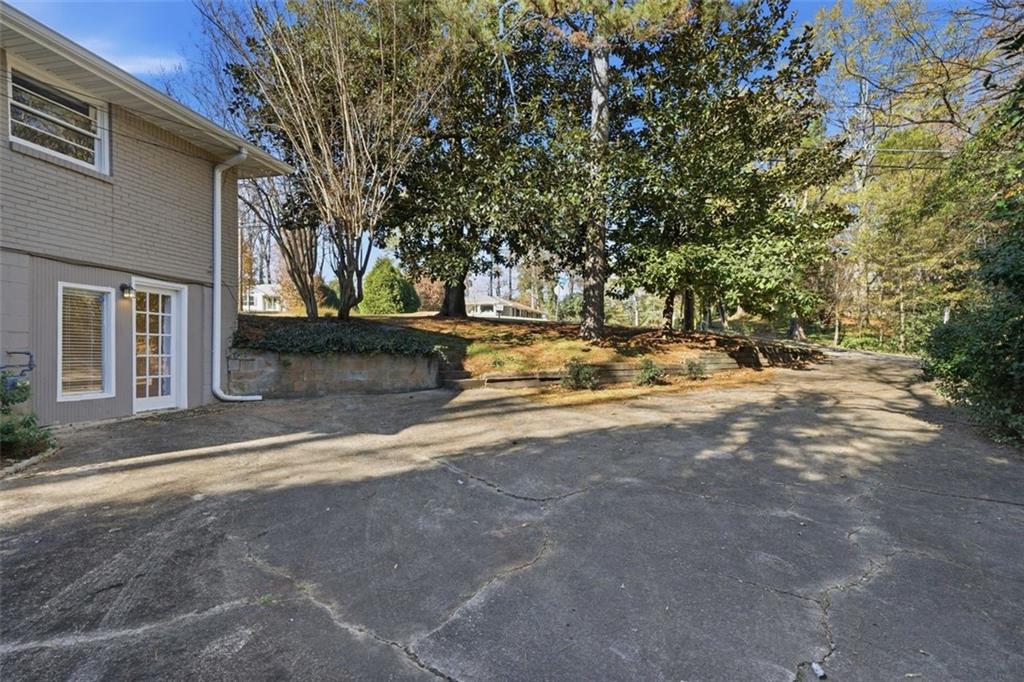 2002 Drew Valley Road Northeast Brookhaven, GA 30319 - Photo 42 of 51 a view of road with large trees