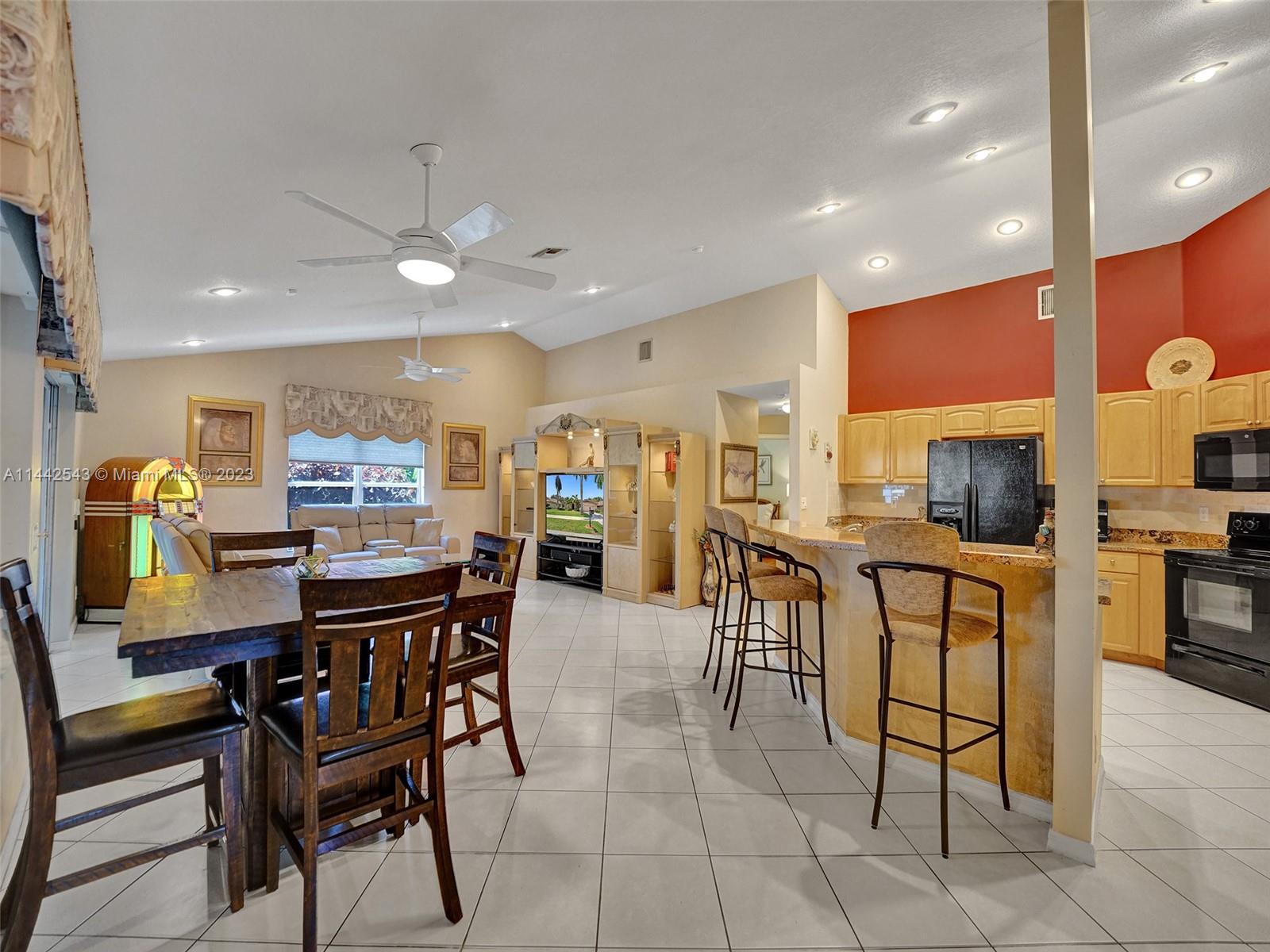 3273 Ridge Trace Davie, FL 33328 - Photo 18 of 74 a view of a dining room with furniture