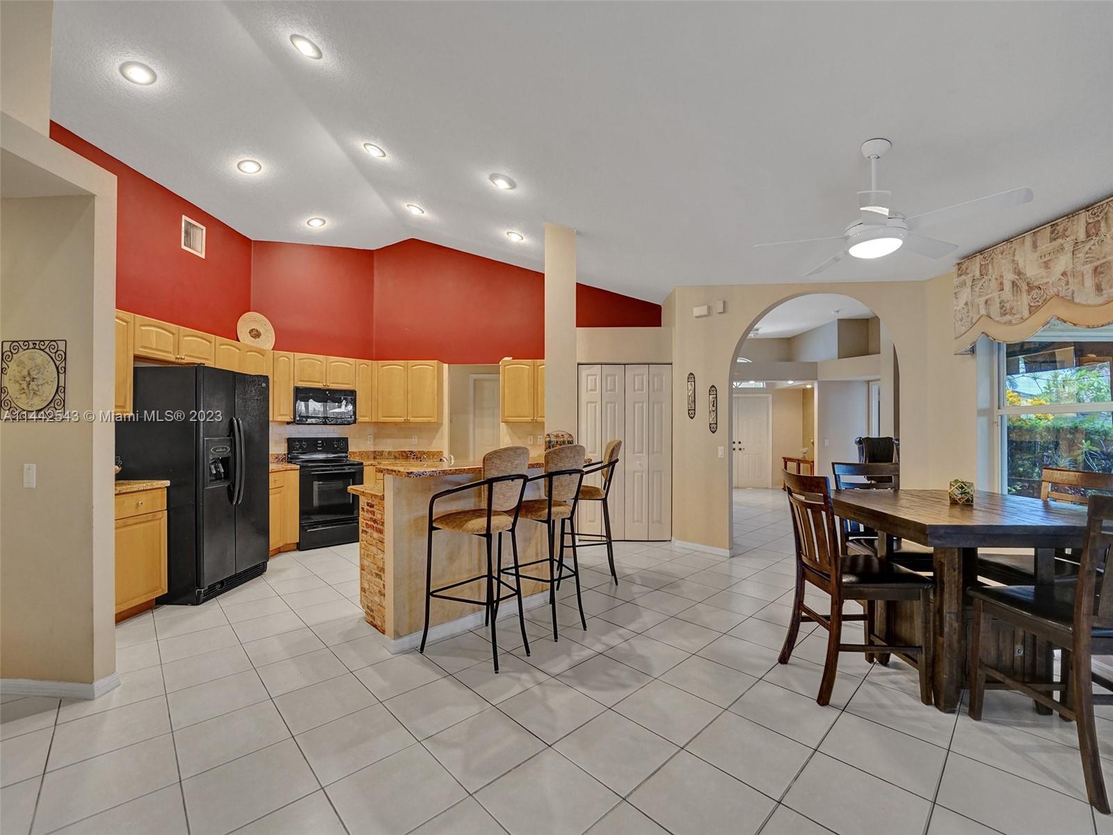 3273 Ridge Trace Davie, FL 33328 - Photo 22 of 74 a view of a dining room with furniture