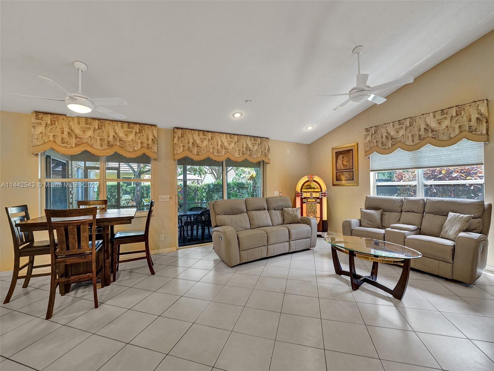 3273 Ridge Trace Davie, FL 33328 - Photo 27 of 74 a living room with furniture and a large window