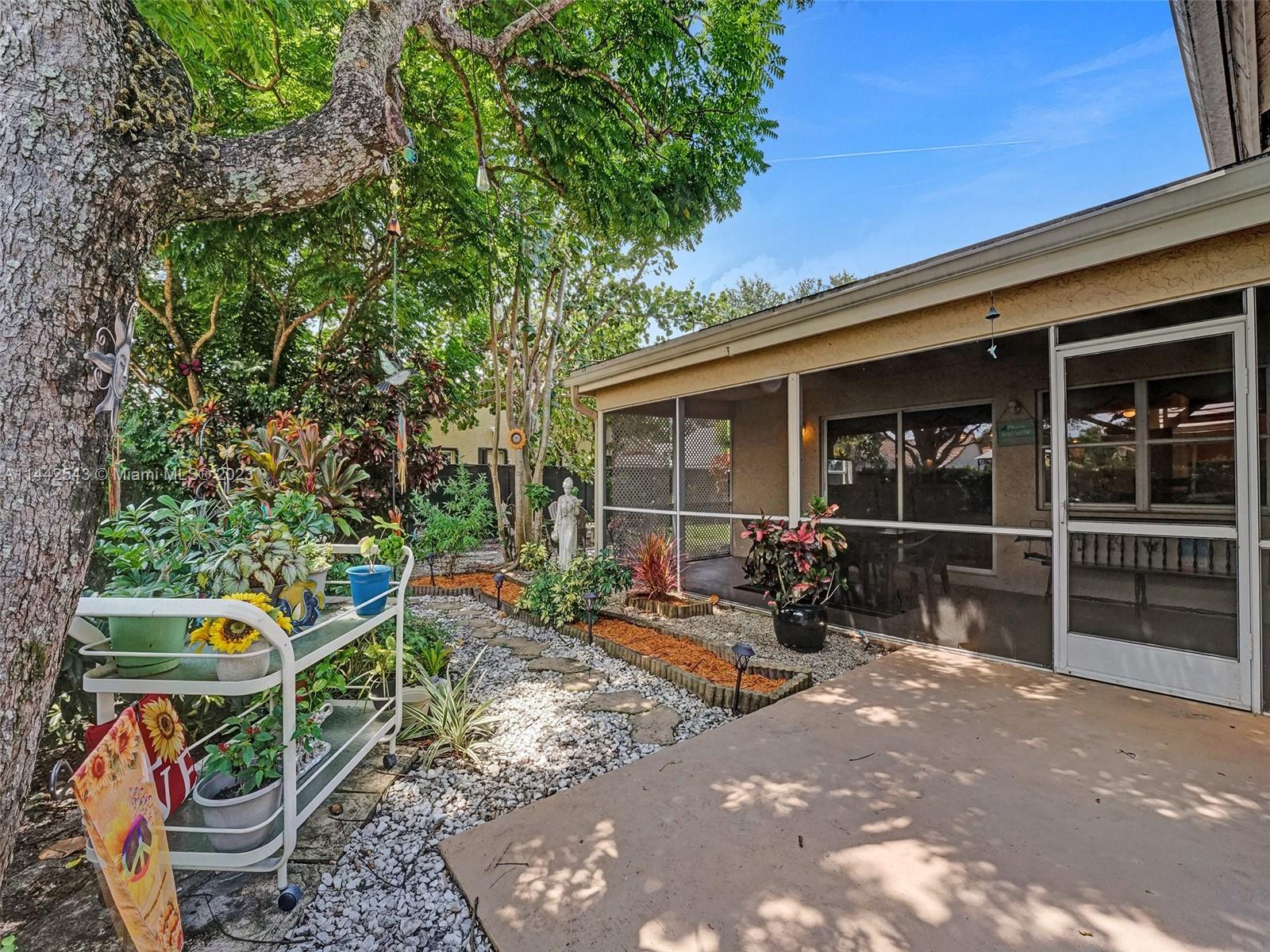 3273 Ridge Trace Davie, FL 33328 - Photo 65 of 74 a view of an outdoor space with a patio