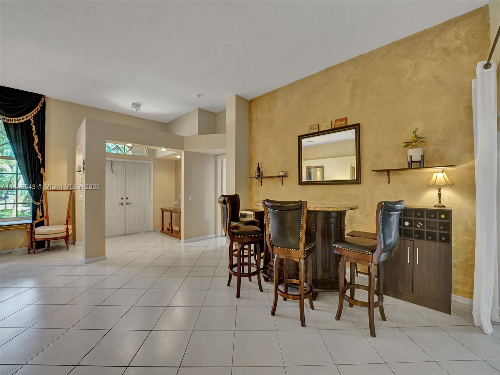 3273 Ridge Trace Davie, FL 33328 - Photo 8 of 74 a view of a a dining room with furniture