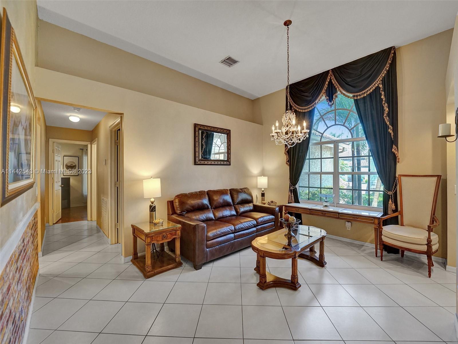 3273 Ridge Trace Davie, FL 33328 - Photo 10 of 74 a living room with furniture and a window