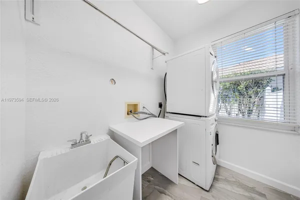 a bathroom with a sink and a bathtub