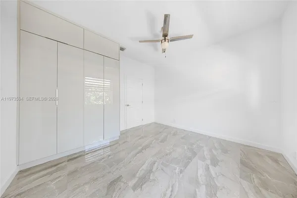 a view of a room with a hallway