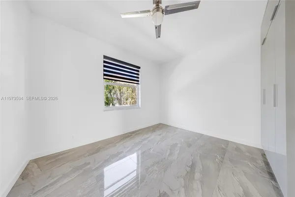 an empty room with windows