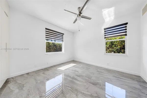 an empty room with windows