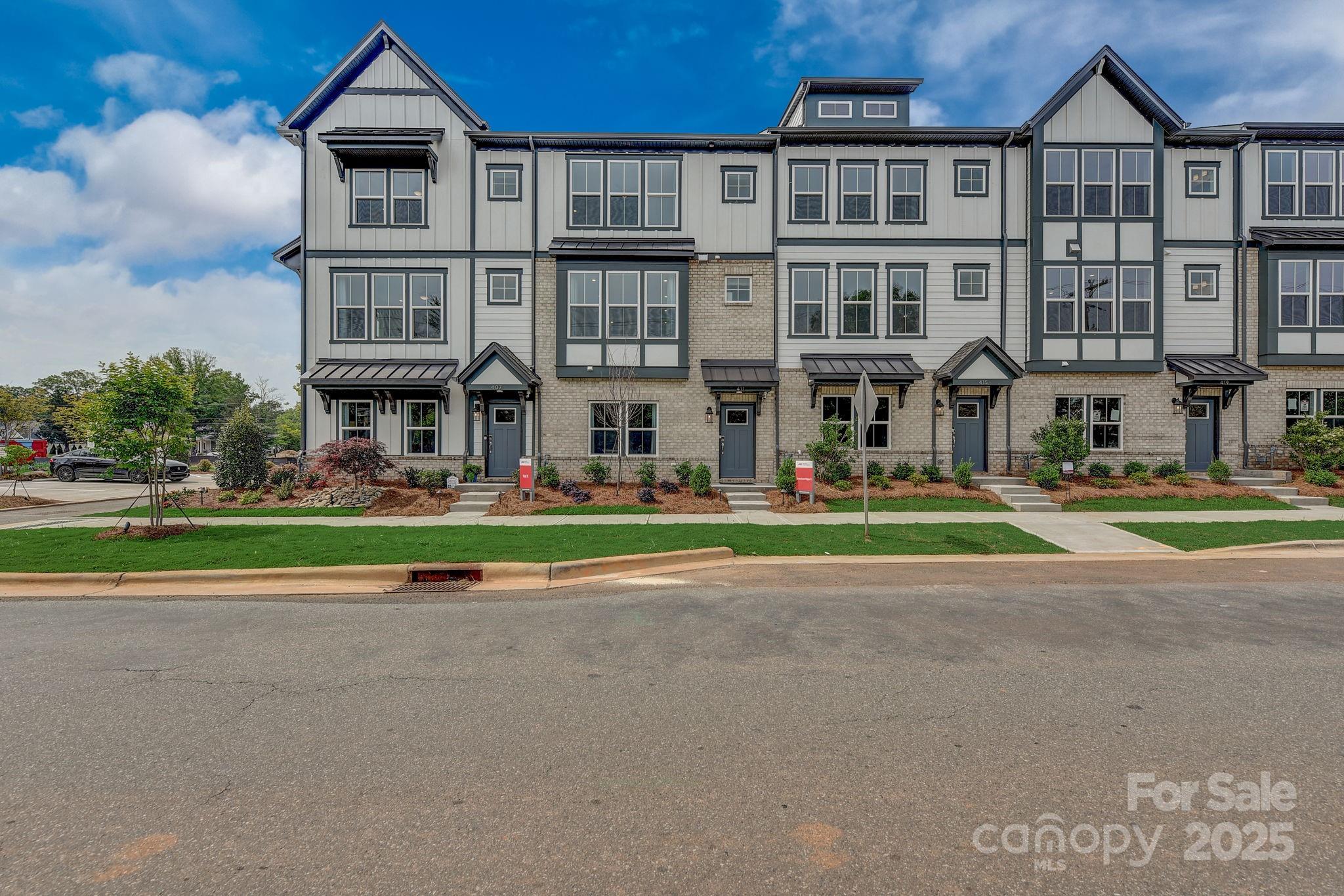 411 Jetton Street Davidson, NC 28036 - Photo 29 of 37 front view of an buildings with a street