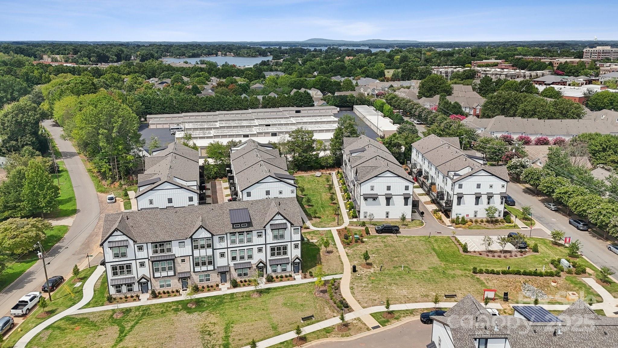 411 Jetton Street Davidson, NC 28036 - Photo 37 of 37 an aerial view of residential houses with outdoor space and swimming pool