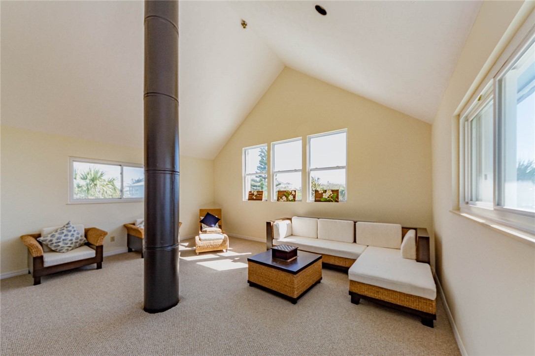 1850 East Sandpiper Road Vero Beach, FL 32963 - Photo 15 of 36 a living room with furniture and a window