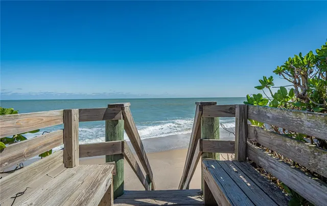a view of balcony with furniture