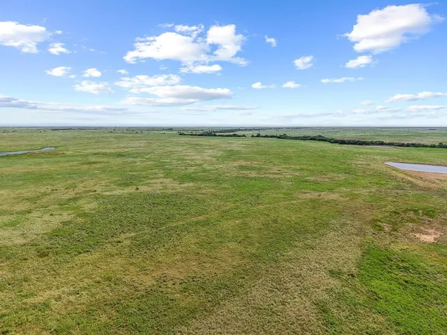 a view of a ocean with a beach