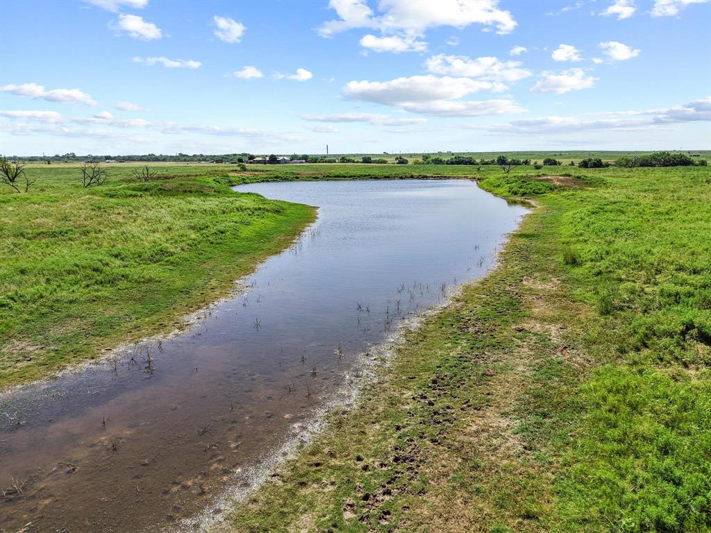32 State Highway 32 Ryan, OK 73565 - Photo 10 of 40 a view of a lake with a big yard
