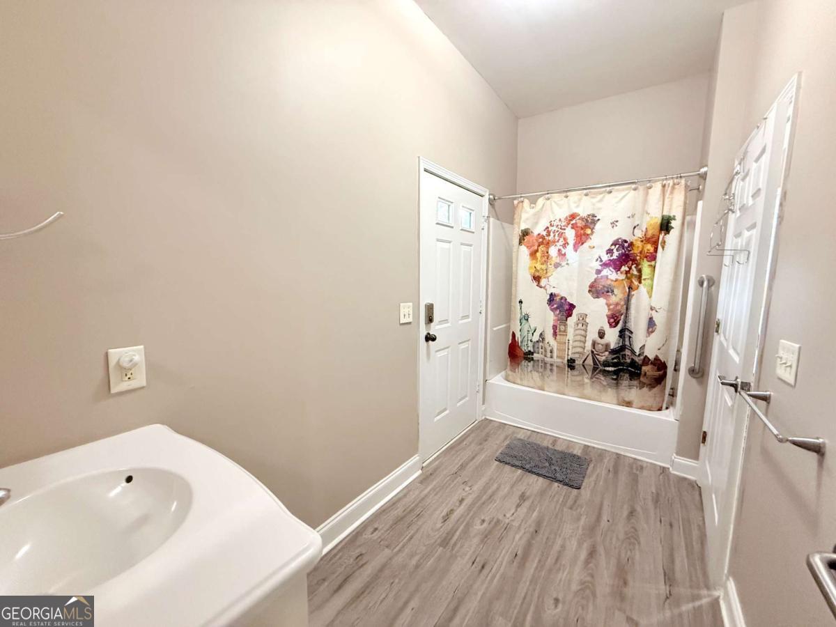 2415 Elko Road Elko, GA 31025 - Photo 21 of 85 a bathroom with a bathtub and shower