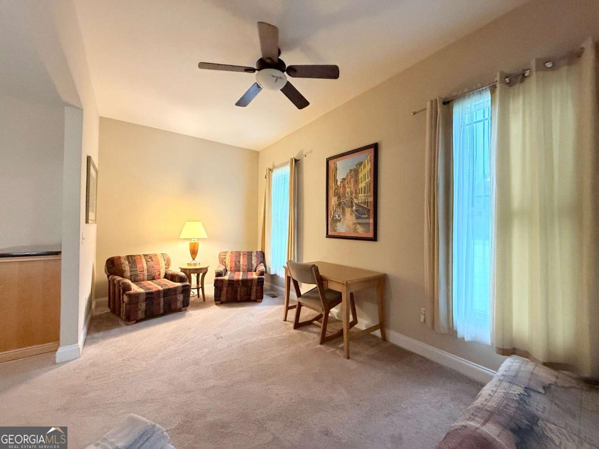 2415 Elko Road Elko, GA 31025 - Photo 26 of 85 a living room with furniture and a window