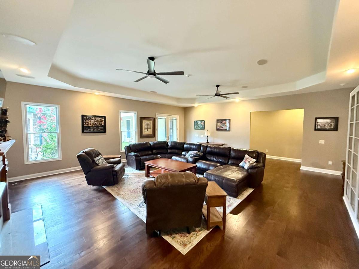 2415 Elko Road Elko, GA 31025 - Photo 40 of 85 a living room with furniture wooden floor and window