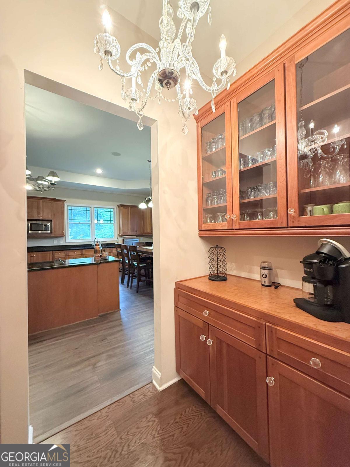 2415 Elko Road Elko, GA 31025 - Photo 6 of 85 a kitchen with stainless steel appliances granite countertop a sink counter space cabinets and a large window