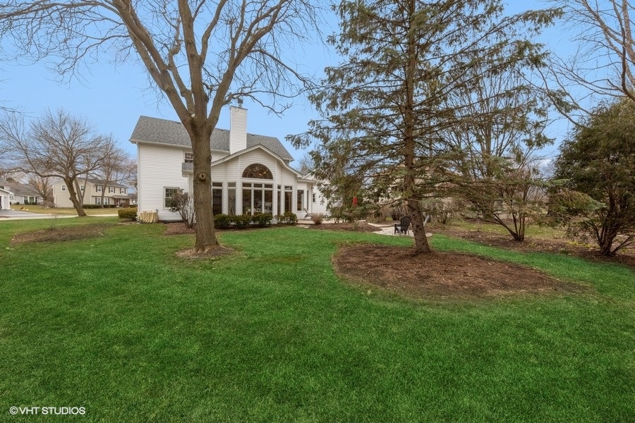 1545 Preston Road Naperville, IL 60563 - Photo 38 of 38 a front view of a house with a yard