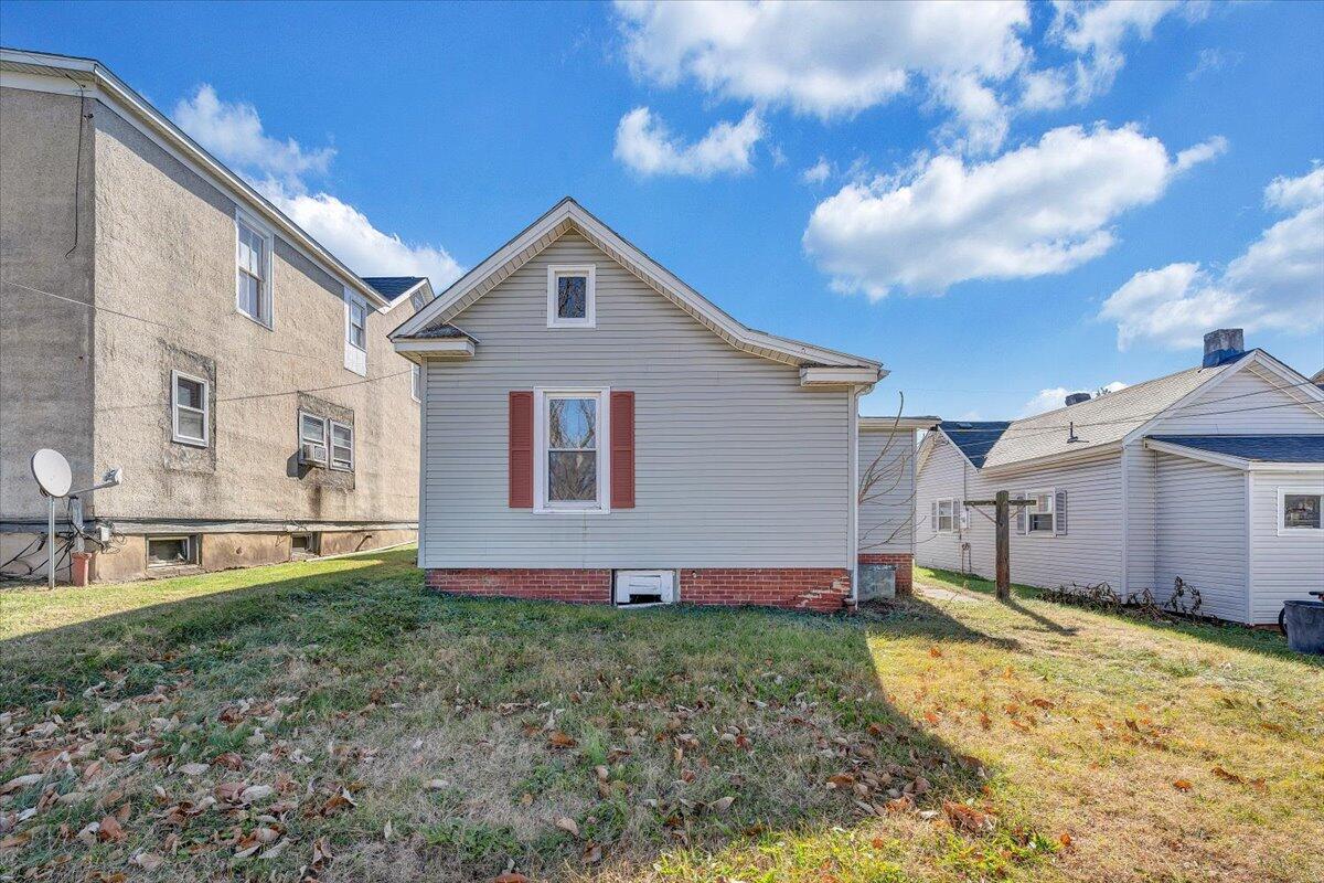 228 East Beech Street Covington, VA 24426 - Photo 23 of 28 a view of a house with a yard