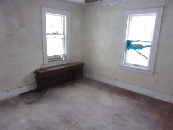 an empty room with windows