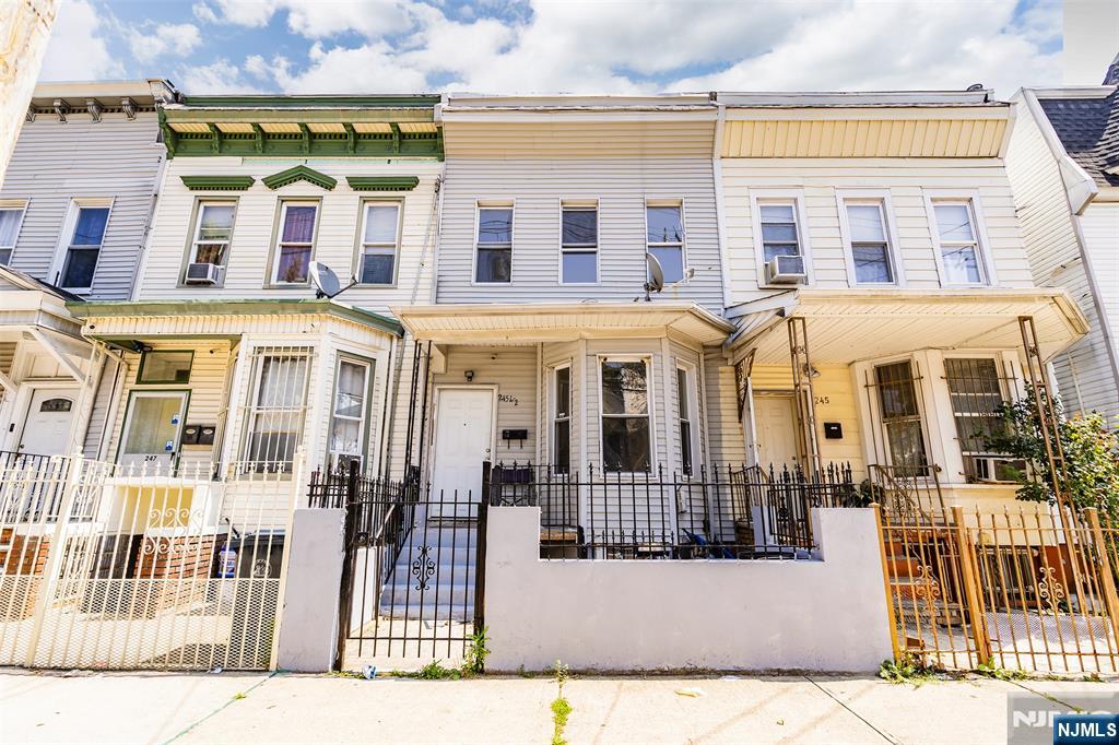 a front view of a building with a glass door