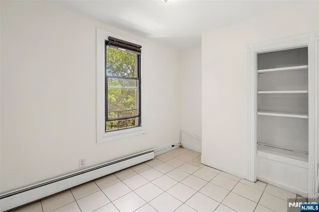 a view of an empty room with window